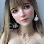 Close-up of the ROS head sculpt and E-cup figure on the Annika.G doll
