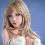Side view of the Kitty doll showing the fixed silicone head